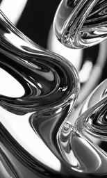 a close up of an abstract silver object