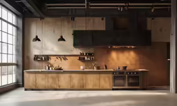 an industrial style kitchen is shown with wooden walls