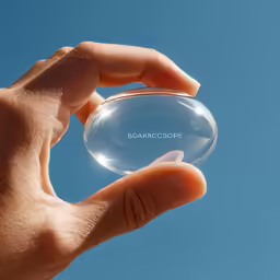 a person holding an object with their fingers