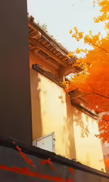 a wall with an orange tree in the foreground