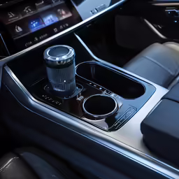 a car dashboard with the controls and center console