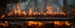 hot coal bbq grill with flames being used