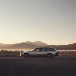 a white car parked on the side of the road