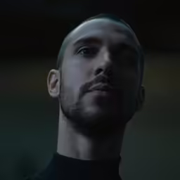 the man is looking up into the sky