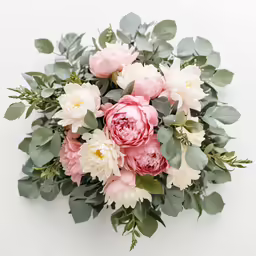 a large bouquet of pink and white flowers
