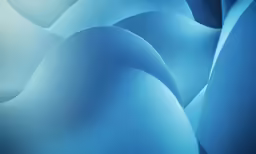 a computer generated photo that looks like flowing blue material