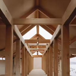 the inside of an unfinished building with a view of snow