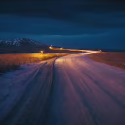 a dark road in the middle of nowhere