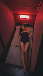 an erotic woman laying down in a room