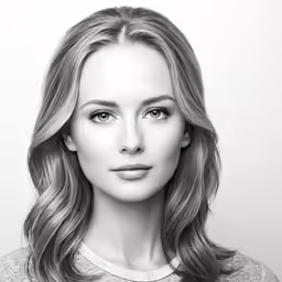 a beautiful young woman posing for the camera
