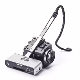 the camera is connected to a telephote with an extension cord