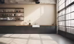an empty room with lots of shelves and sinks