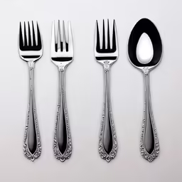 an array of different spoons with one white