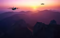 a couple of planes flying over the mountains