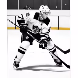 a hockey player skating on the ice during a game