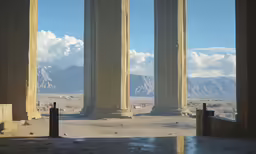 an open porch with four pillars in the desert