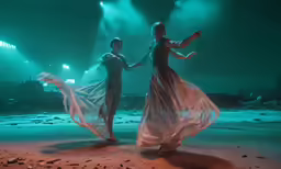 the couple is dancing around together in their dance moves