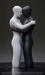 a white female and black male doll are embracing
