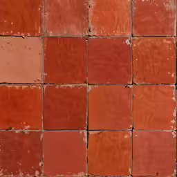 a photo of a tile floor with cracks and paint