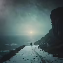 man walking on a path into the night over ocean