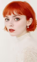 a red haired girl with bright orange hair