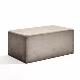 a cement box sitting up against a white background