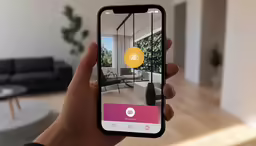 a person holding up a smart phone with an app