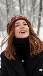 a woman with long red hair is smiling outside in the snow