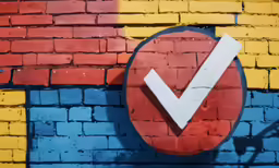 the colors and shapes of a brick wall, with a check mark painted on it