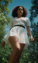 a woman with her legs high in the air