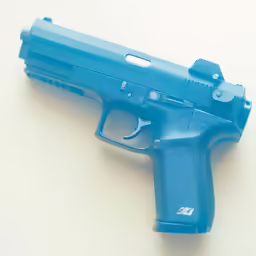 a blue handgun on a white surface