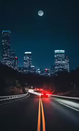 night view of an interstate with traffic on it