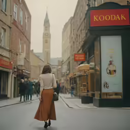 a person is walking in the middle of the street