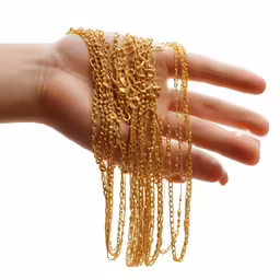 the woman is wearing a bracelet and chains
