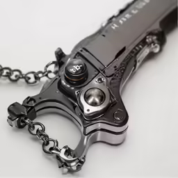a gun with a metal chain on it