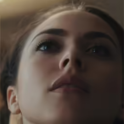 a woman with a nose piece has one eye on her face