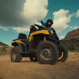 there is a couple riding a big quad bike