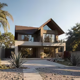 a large house with a balcony on top