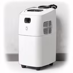 a small portable air puzzizer sitting against the wall