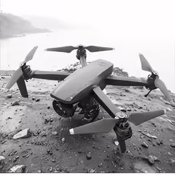 a picture of a black and white photo of a small plane with propellers