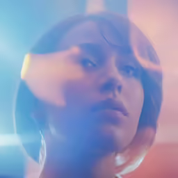 a woman with a futuristic haircut with blue lights around her