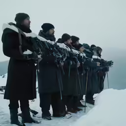 there is a large group of men in the snow