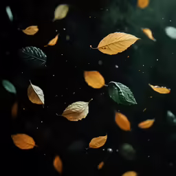 golden and green autumn leaves with rain on them