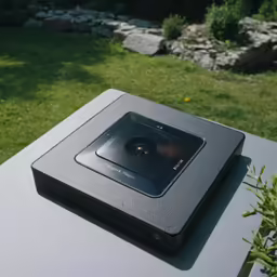 a digital camera on top of a table