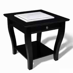 a small side table with a black base and white top