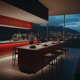 a very large long kitchen with many chairs