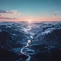 view of a river and mountains in a valley