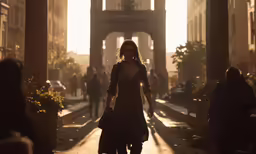 a woman walks down a street in front of a traffic light