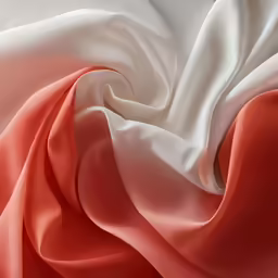 pink and white fabric folded together