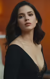 a woman that is wearing a black shirt